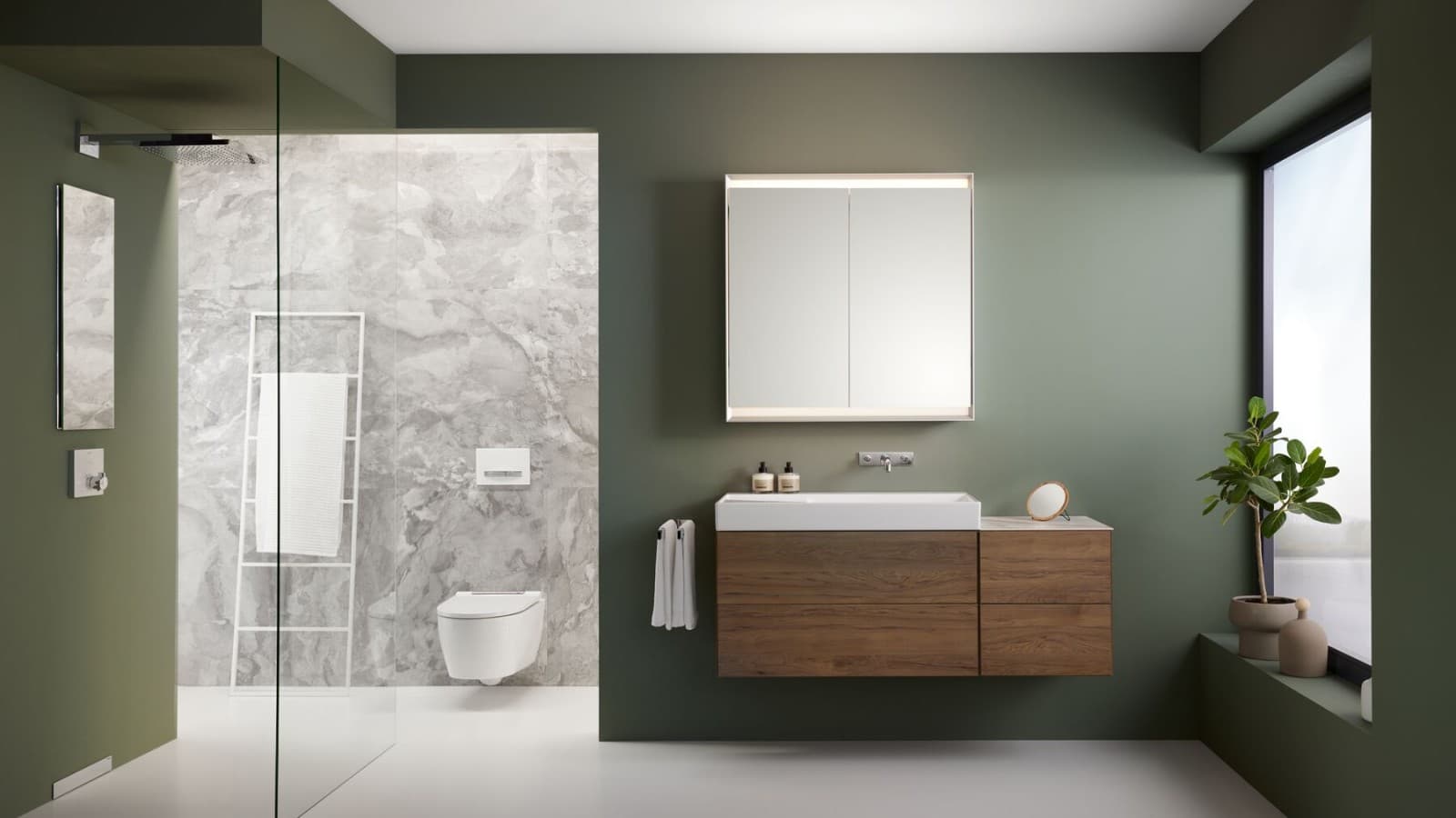 Spacious bathroom with wall-hung furniture and ceramics Spacious bathroom with wall-hung furniture and ceramics