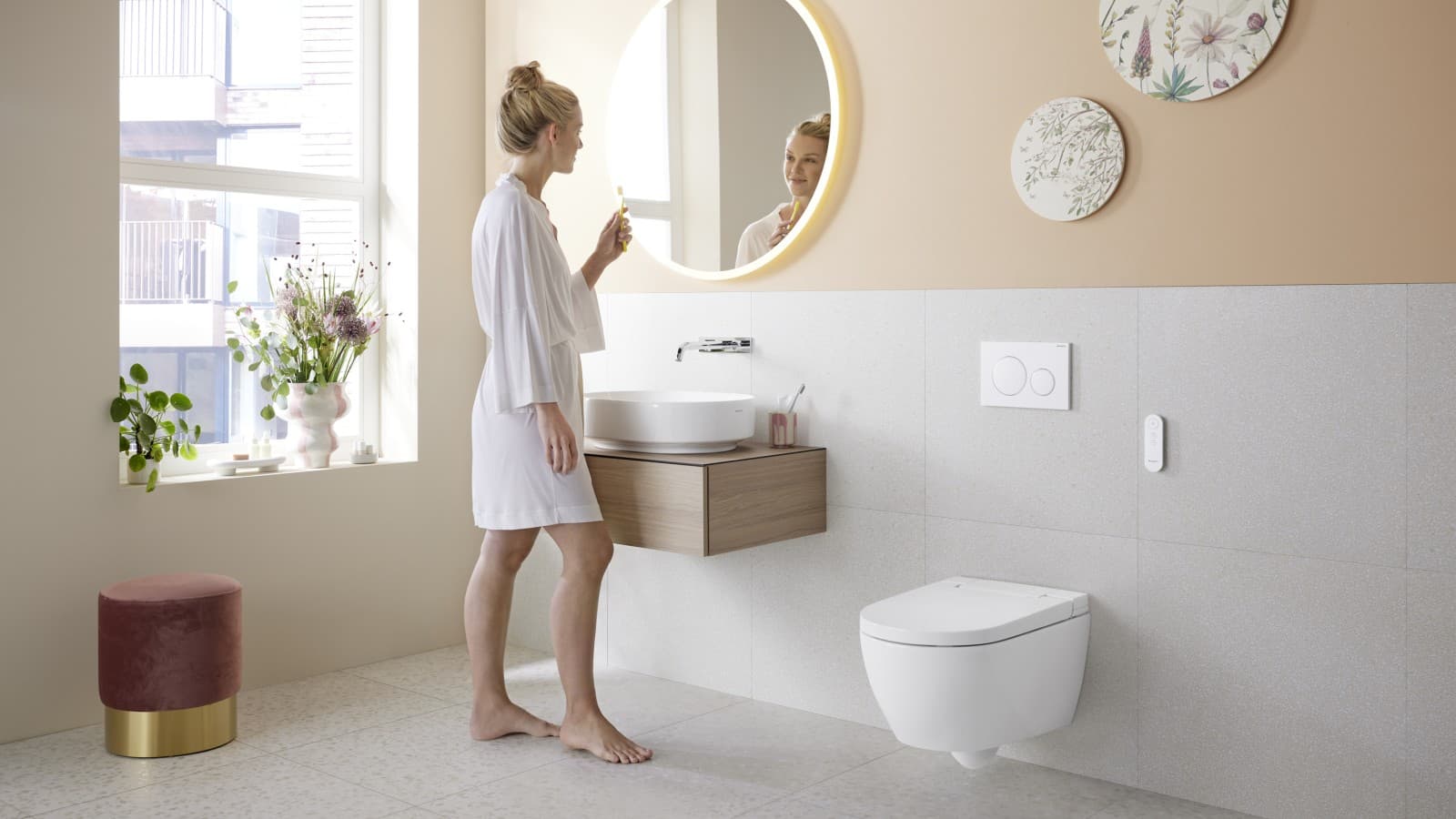 Peach-tone bathroom with Geberit 2x6 in-wall toilet system Peach-tone bathroom with Geberit 2x6 in-wall toilet system