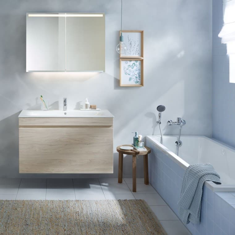 Bathroom with toilet and washplace, plus bathtub Bathroom with toilet and washplace, plus bathtub