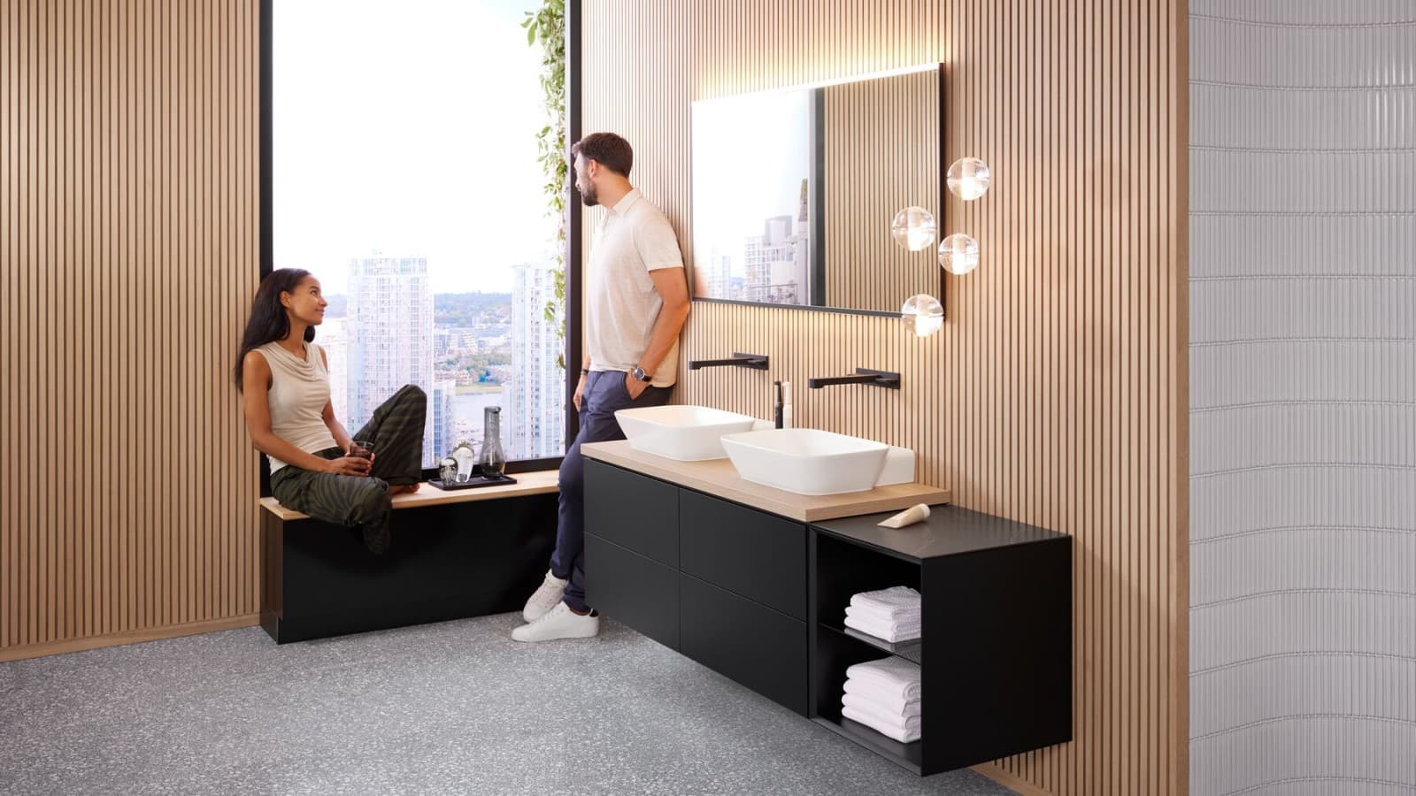 Woman sitting on windowsill in bathroom Woman sitting on windowsill in bathroom