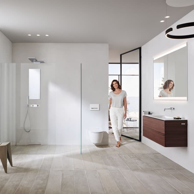Woman in a white bathroom Woman in a white bathroom