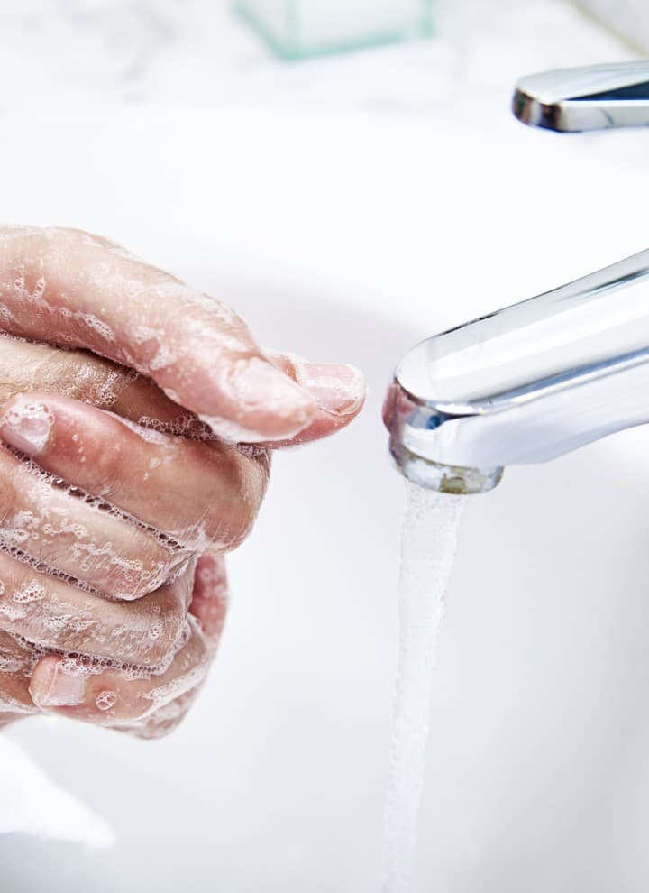 Washing hands in the washbasin Washing hands in the washbasin
